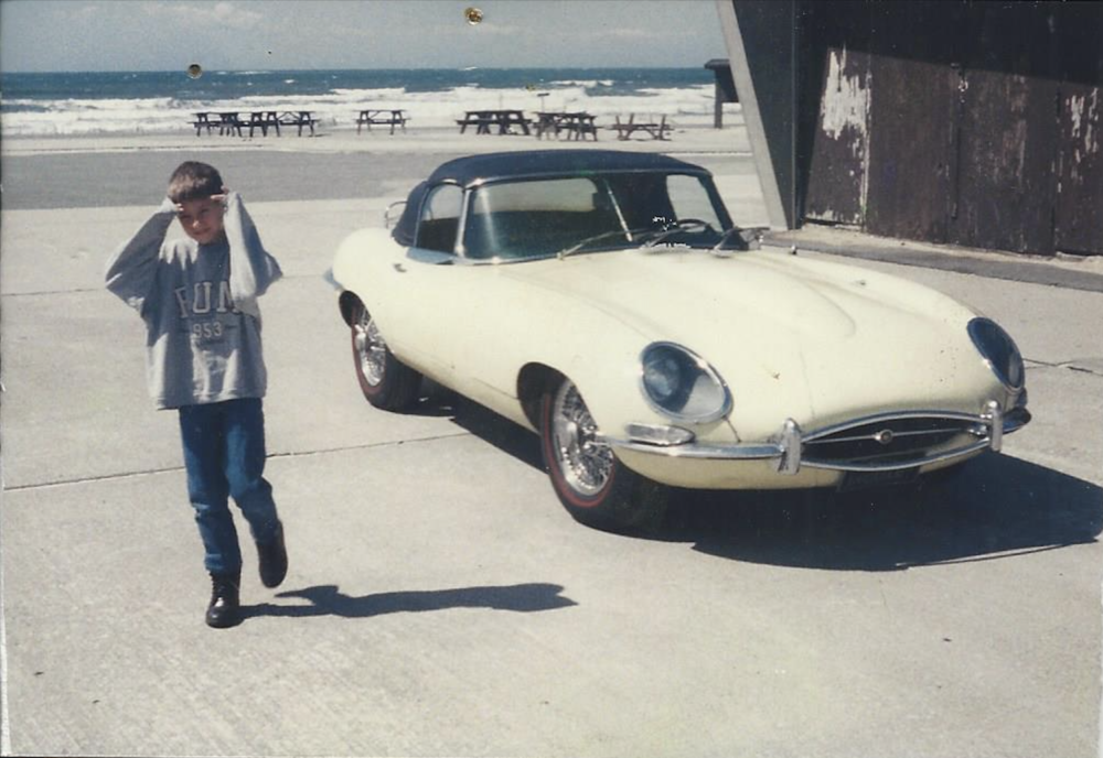 Young Dan with Ray’s 1967 Jaguar E-type OTS.